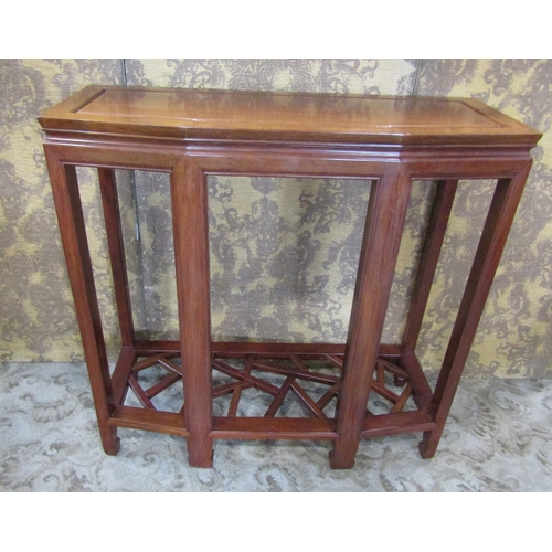 2298 - A contemporary Chinese hardwood side table on moulded supports with pierced under gallery, 92 cm wid... 