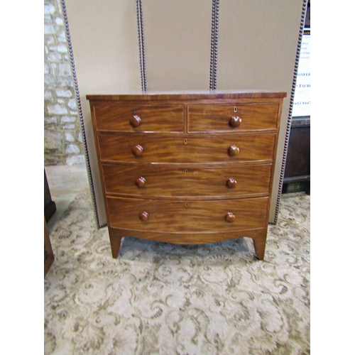 2307 - A Victorian mahogany bow fronted chest of three long and two short drawers on splay supports , 103 c... 