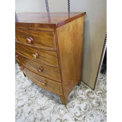 2307 - A Victorian mahogany bow fronted chest of three long and two short drawers on splay supports , 103 c... 