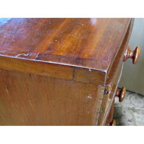 2307 - A Victorian mahogany bow fronted chest of three long and two short drawers on splay supports , 103 c... 