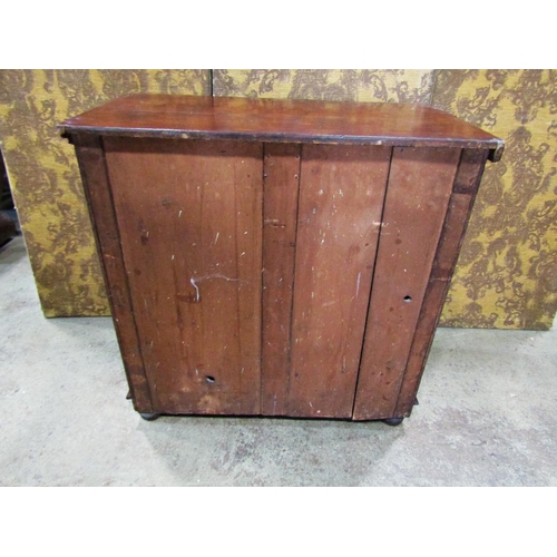 2309 - A small Victorian mahogany chest of two long and two short drawers, 88 cm wide