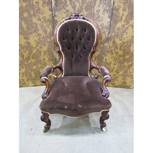 2323 - A Victorian spoon back drawing room chair with carved and moulded walnut show wood frame and later u... 