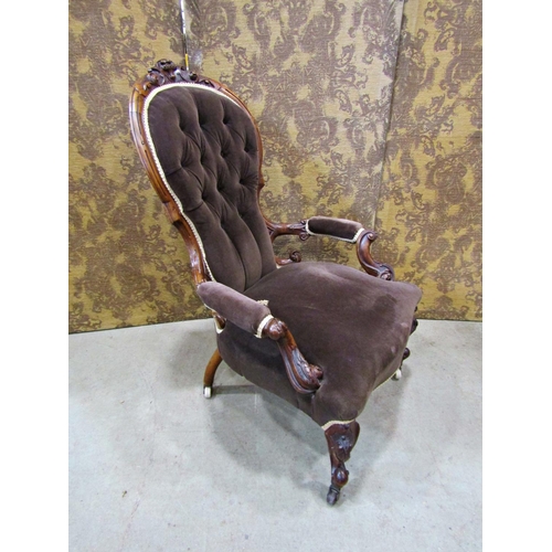 2323 - A Victorian spoon back drawing room chair with carved and moulded walnut show wood frame and later u... 