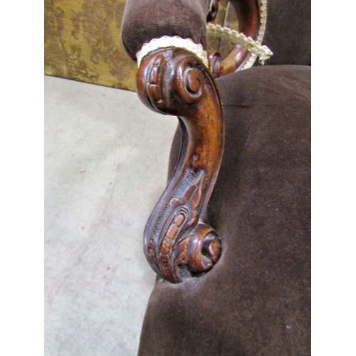 2323 - A Victorian spoon back drawing room chair with carved and moulded walnut show wood frame and later u... 