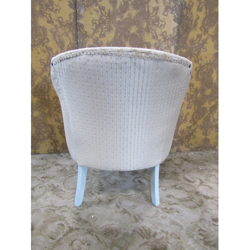 2331 - A small tub chair, the framework with painted finish and later upholstery