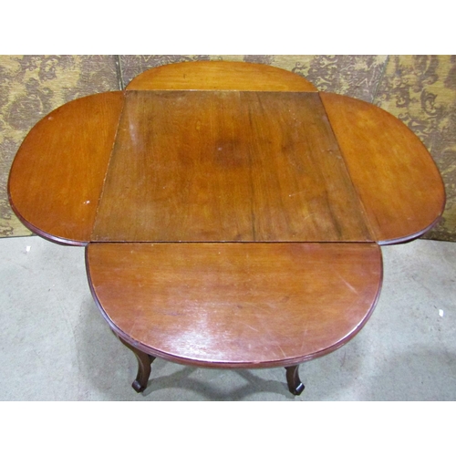 2332 - A small Edwardian centre table with four drop leaves on shaped supports with under gallery, 45cm squ... 