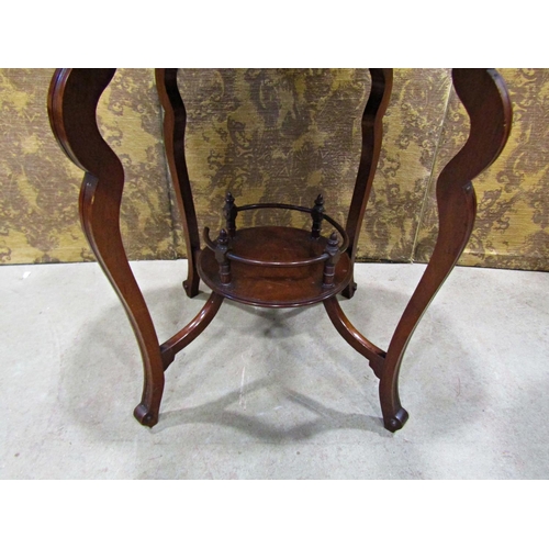 2332 - A small Edwardian centre table with four drop leaves on shaped supports with under gallery, 45cm squ... 