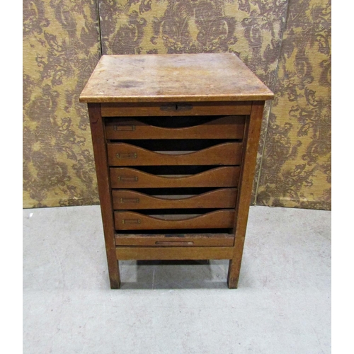 2333 - A small oak tambour front filing cabinet enclosing five drawers, 50cm wide x 73cm high