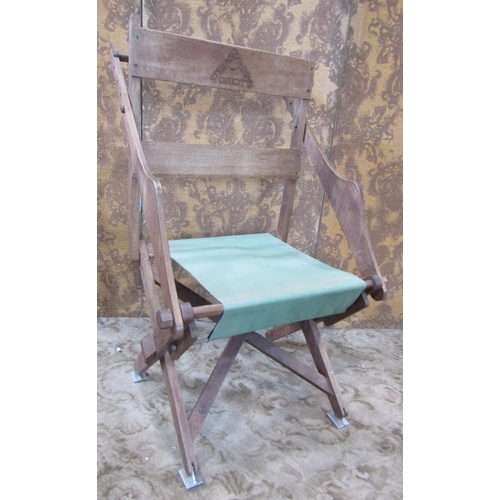 2340 - An oak framed adjustable chair with canvas seat