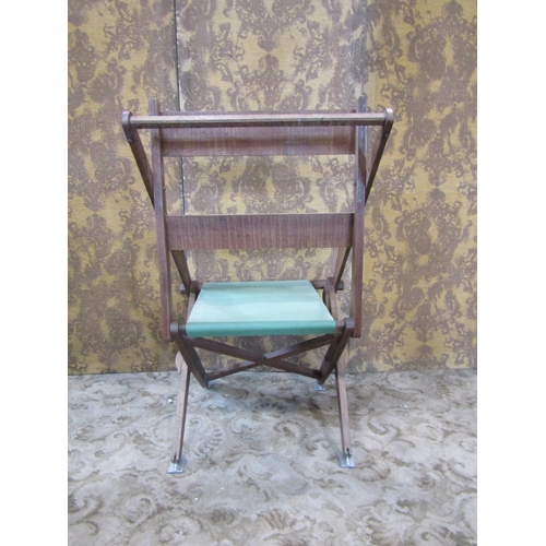 2340 - An oak framed adjustable chair with canvas seat