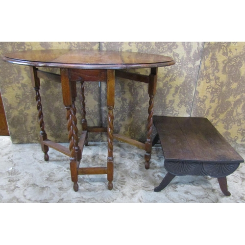 2352 - A small oak gateleg occasional table on barley twist supports together with a rustic oak stool with ... 