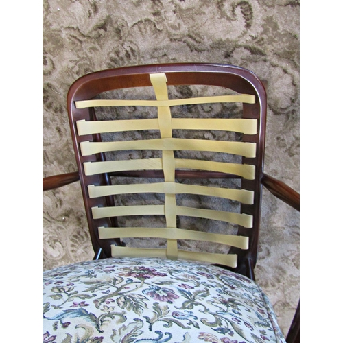 2353 - An Ercol drawing room chair with upholstered seat and back