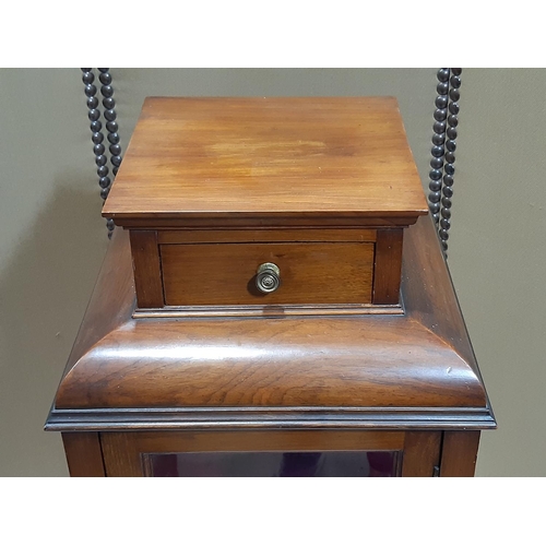 2283 - An Edwardian mahogany vitrine with glazed panels to all sides raised on square taper legs, 38 cm squ... 