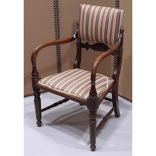 2329 - A regency countrymade elbow chair with upholstered seat and back panel