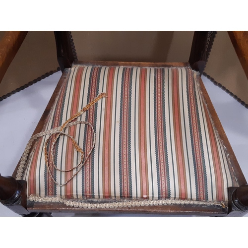 2329 - A regency countrymade elbow chair with upholstered seat and back panel