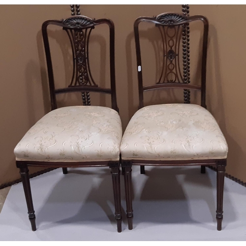 2351 - A pair of good quality Edwardian side chairs, the carved and moulded frames with pierced splats, uph... 