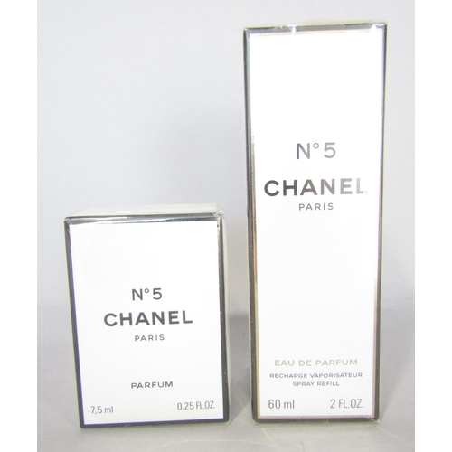 Eight Chanel No5 products, seven still in cellophane wrappers