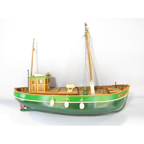 A remote controlled wooden model fishing boat, “Albatross”, 71cm long with  a remote control hand set