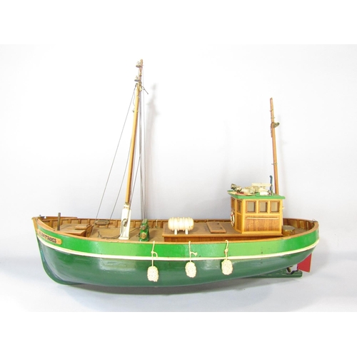 A remote controlled wooden model fishing boat, “Albatross”, 71cm long with a  remote control hand set