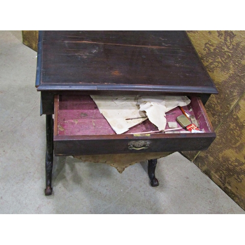 2191 - A 19th century mahogany sewing table with frieze drawer raised on open scrolled and lyre shaped supp... 