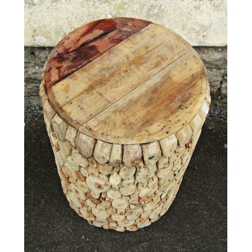 2224 - A novelty rustic cylindrical stool, 40cm diameter x 58cm high