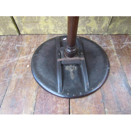 2614 - A 19th century mahogany circular snap top occasional table with turned pillar and shaped tripod