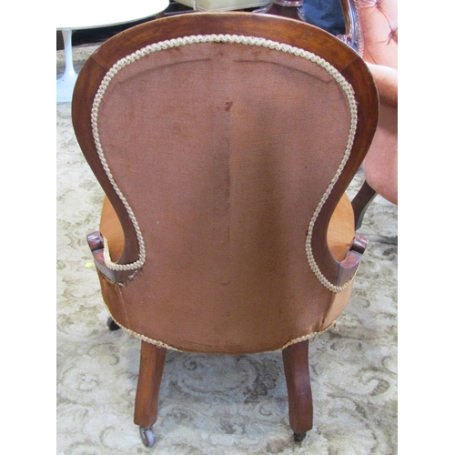 2327 - A Victorian mahogany drawing room chair with moulded show wood frame and serpentine seat