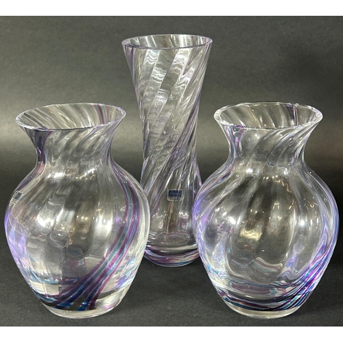 1176 - Six examples of Caithness glass vases from the Flamenco collection, all in lilac with spiral decorat... 