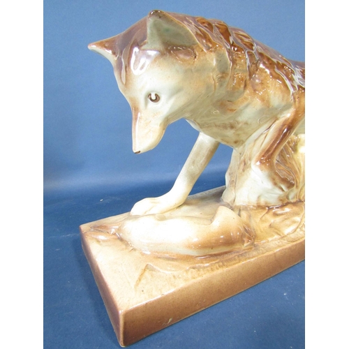 1046 - A continental ceramic figure of a fox with game with incised signature - Savioli