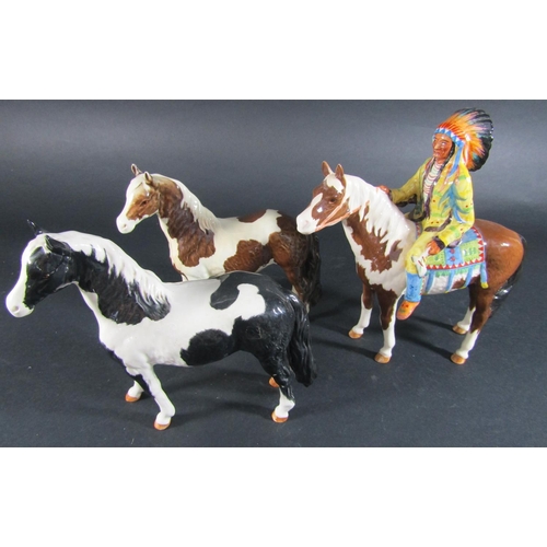 1074 - A Beswick model of a mounted Indian model number 1391 together with a Beswick skewbald pinto pony nu... 