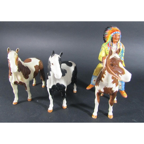 1074 - A Beswick model of a mounted Indian model number 1391 together with a Beswick skewbald pinto pony nu... 