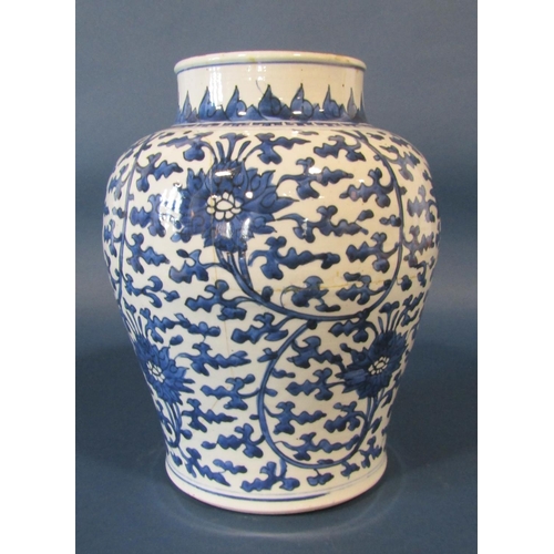 1065 - A c.18th century Chinese baluster vase with repeating floral detail, 31 cm height (AF)