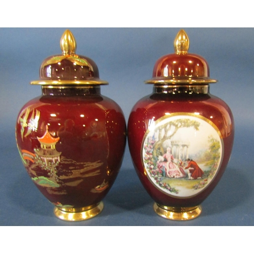 1080 - A Carltonware Rouge Royale oviform vase and cover with chinoiserie detail together with a further si... 