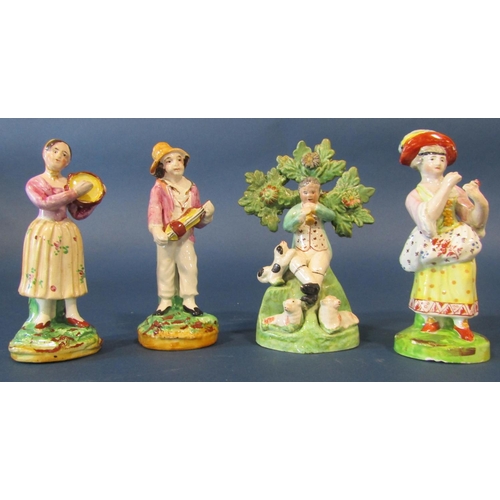 1081 - Four 18th century Staffordshire figures of three musicians, a flower girl (4)