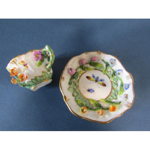 1086 - A miniature German porcelain (probably Meissen) tea service comprising teapot, sucrier and cover, mi... 