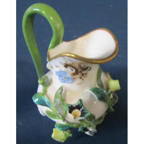 1086 - A miniature German porcelain (probably Meissen) tea service comprising teapot, sucrier and cover, mi... 