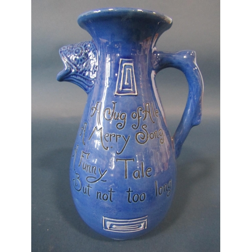 1087 - Barumware fish jug in a blue colourway with incised script, the spout in the form of a fishes head, ... 