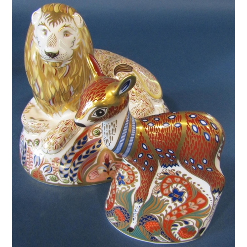 1093 - A Crown Derby fawn (silver stopper) and a Crown Derby figure of a lion at his feet a mouse set on an... 