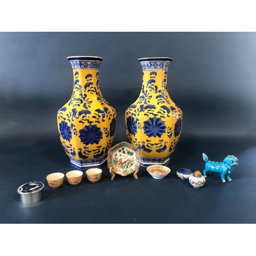 1062 - A collection of Chinese porcelain including a pair of hexagonal vases with drawn necks with blue flo... 