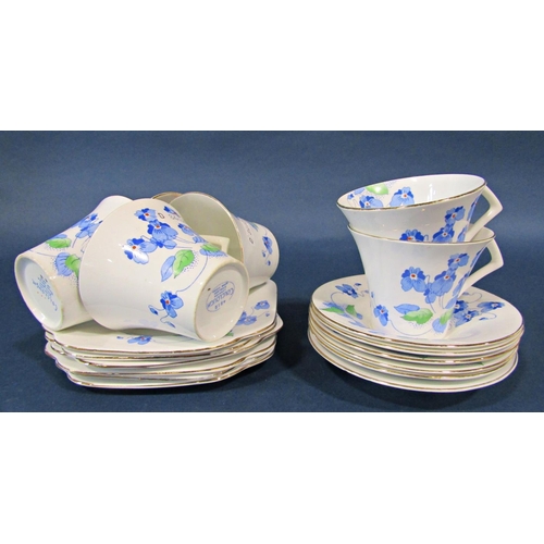 1126 - A Colclough tea service in an art deco style for six with blue flower detail together with a small a... 