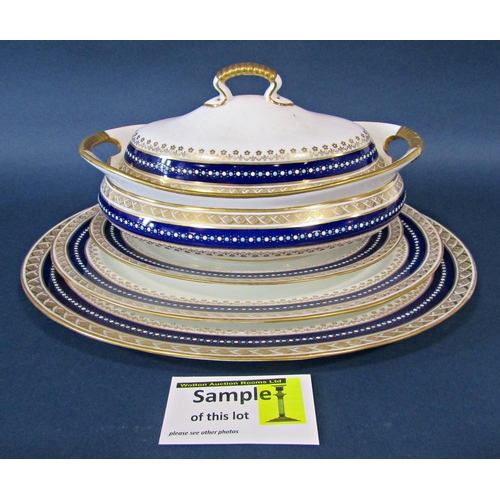 1133 - A quantity of Wedgwood dinner ware with a repeating blue and gilt banded colourway comprising meat p... 