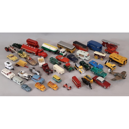 406 - A collection of unboxed vintage model vehicles by various makers including Corgi, Lesney Matchbox, T... 