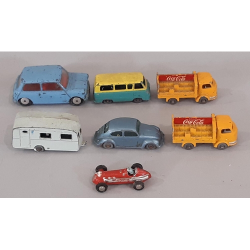 406 - A collection of unboxed vintage model vehicles by various makers including Corgi, Lesney Matchbox, T... 