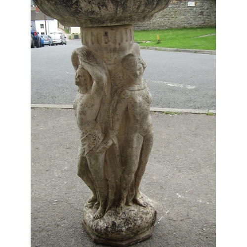 2065 - A weathered cast composition stone two sectional three graces bird bath with circular top, 42 cm in ... 