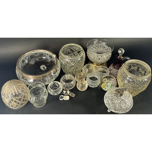 1182 - A mixed collection of heavily engraved glassware including a bowl with a silver rim, jars and vases,... 