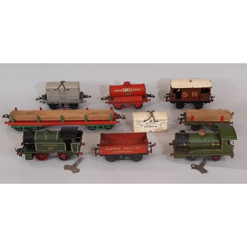 417 - Hornby 0 gauge railway collection including 2 x 0-4-0 clockwork locomotives in Southern Green, vario... 