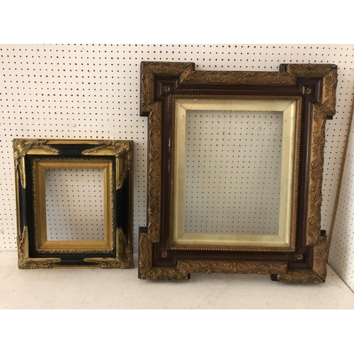 135 - Two c.19th century decorative gilt moulded frames, one with glass, one without, largest: 68 x 59.5 c... 