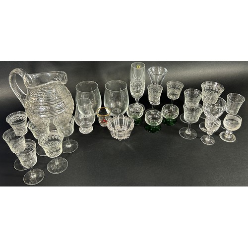 1206 - A mixed selection of glass ware including Victorian style etched glasses, small green base glass jug... 