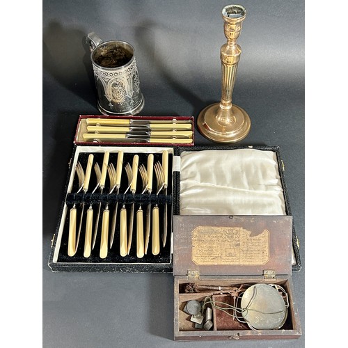 1222 - A vintage suitcase containing loose silver plated flatware, a cased set of fish knives and forks, a ... 