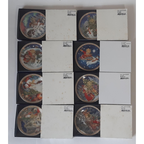 1193 - Large collection of Royal Worcester boxed commemorative and Christmas themed ceramics, including coa... 